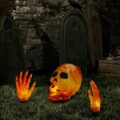 Northlight 8.5" Spooky Town Lighted Orange Skull and Hands Outdoor Halloween Decoration - 4ft Black Wire